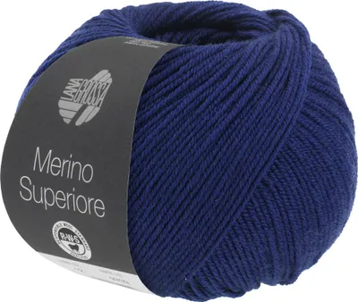 A ball of dark blue yarn with a label.