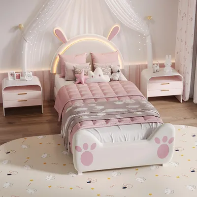 Immagine prodotto di Letto imbottito per bambini UnboxG 90x200 cm con motivo a coniglietto e illuminazione d'atmosfera a LED, morbido tessuto in velluto e motivo a zampe, struttura sicura per la cameretta delle bambine
