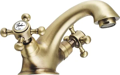 A close-up studio shot of a bronze-colored faucet with two cross-shaped handles.
