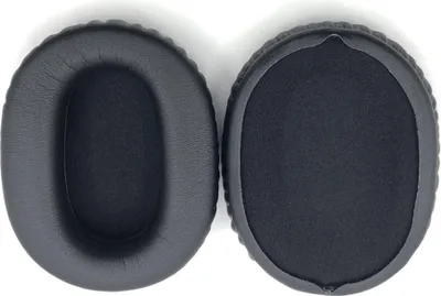 Two black ear pads for headphones are shown against a white background.