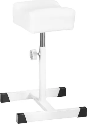 A white pedicure footrest on a white background.