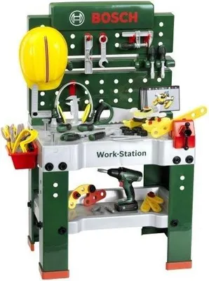 A toy workbench with various tools and accessories.