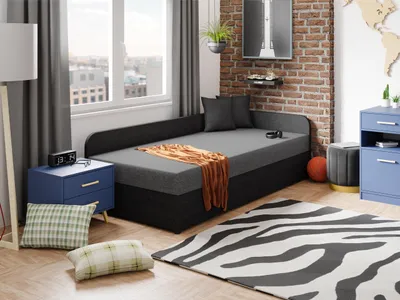 A bedroom scene with a daybed, nightstand, rug, and dresser.