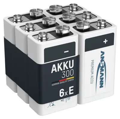 A group of six 9V batteries are arranged in a grid and banded together.