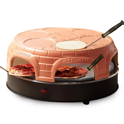 Produktbild von Emerio Pizzarette Original PO-115848.1 – 1500W – Pizzaofen für 6 Personen – Handgefertigte Terrakotta-Kuppel – Pizza Ofen – 6 Backspachteln