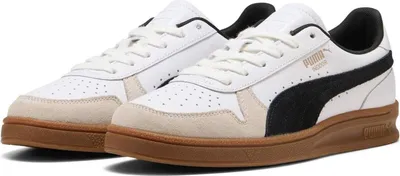 A pair of Puma sneakers on a white background.