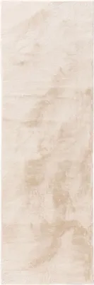 A close-up of a beige rug with a textured, marbled pattern.