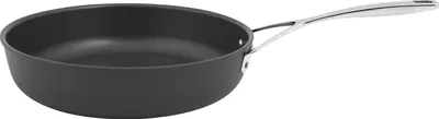 A black frying pan with a silver handle against a white background.