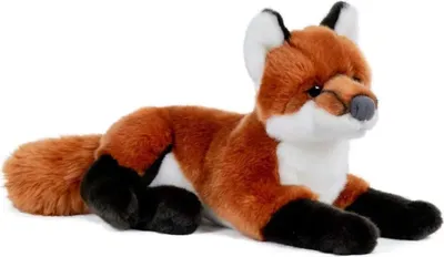 A plush toy fox lying down on a white background.