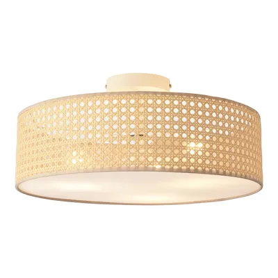 A flush mount ceiling light with a rattan-like shade.