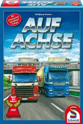 The image shows the box of the board game 'Auf Achse', featuring two trucks on a highway.