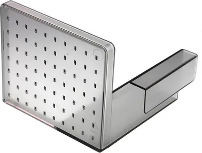 A close-up studio shot of a food slicer attachment.