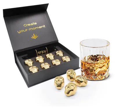 Immagine prodotto di Sassi per whisky con motivo a teschio, color oro