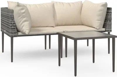 A patio furniture set consisting of a sofa and a coffee table, presented on a white background.