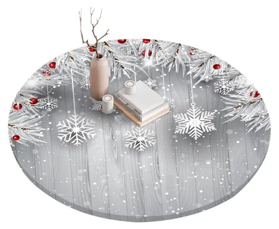 Produktbild von Runde Weihnachtstischdecke mit Schneeflockenmuster, elastischem Rand und wasserabweisender Oberfläche, ideal für runde Tische, zum Essen im Freien oder auf der Terrasse.