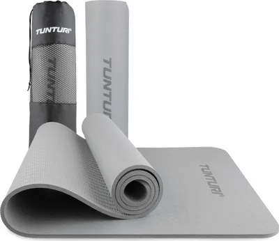 Image de Tunturi Tapis de yoga épais 8mm - Tapis de gymnastique antidérapant - Avec sangle de transport - Pour le yoga et le pilates - Tapis de sport 183x61x0,8cm - Sans substances toxiques - Particulièrement confortable - gris