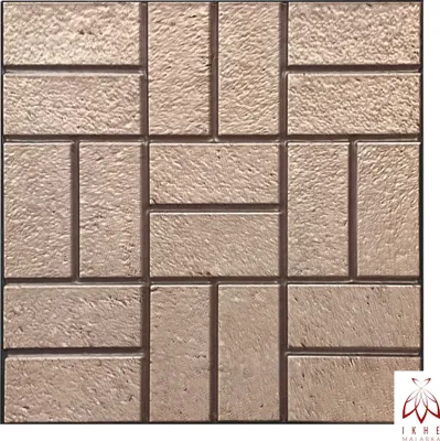 A close-up view of wall panels with a stone-like texture, arranged in a brick pattern.