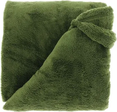 A folded green plaid blanket.