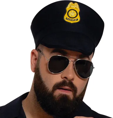 A man wearing a police hat and sunglasses.