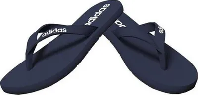 A pair of navy blue Adidas flip-flops are shown against a white background.