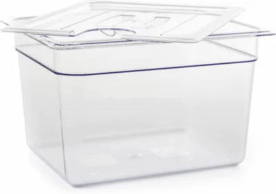 A clear plastic food storage container with a lid.