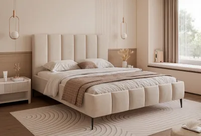 A bedroom scene featuring a beige upholstered bed.