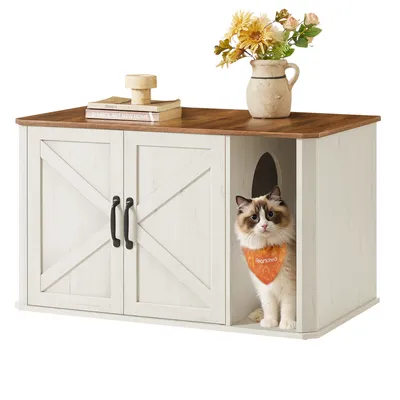 A cat is sitting inside a modern cat litter box enclosure with double doors.