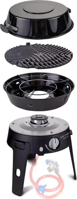 A disassembled camping grill and stove set, with components laid out separately against a white background.