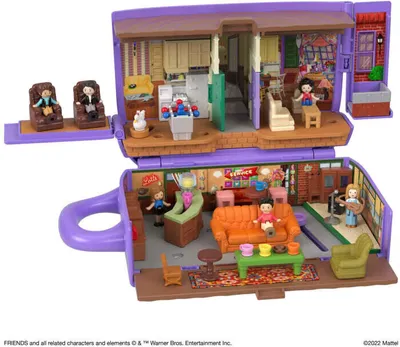 A miniature replica of the Central Perk coffee shop from the TV show Friends, with small figures of the characters.