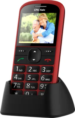 A red CPA Halo 21 Senior mobile phone with a charging stand.