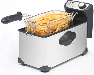 A stainless steel deep fryer filled with french fries, shown on a white background.