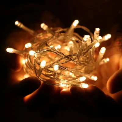 Image de Guirlande lumineuse Ikodm, 10 mètres, 100 LED, lumière blanche chaude, 8 modes, indice de protection IP44, 31 V, gaine blanche, idéale pour Noël et le jardin