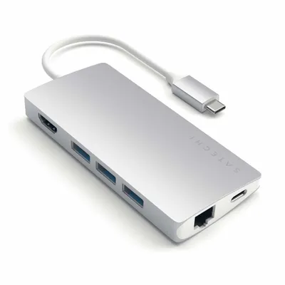 A silver USB-C hub with multiple ports, including HDMI, USB-A, Ethernet, and card readers, is shown on a white background.
