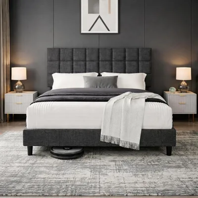 A bedroom scene featuring a bed, nightstands, and lamps.