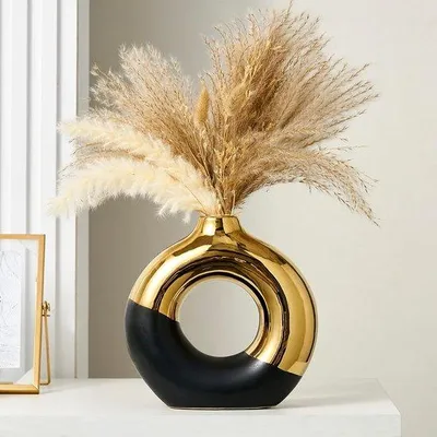 Produktbild von Ibenzoa® Keramikvase in Donut‑Form – elegante schwarz‑goldene Designvase, Ø 25,5 cm, ideal für Pampasgras & Blumenarrangements