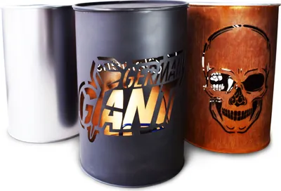 Three metal barrels with cut-out designs, one silver, one black with a logo, and one copper with a skull.