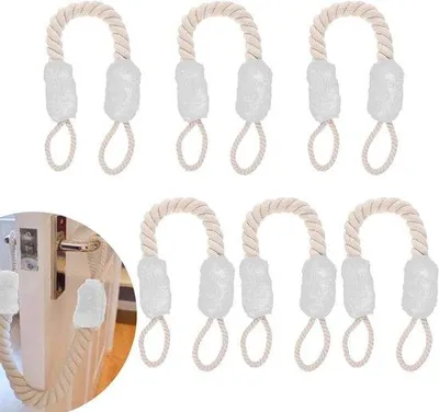 Immagine prodotto di Fermaporta bianchi con protezione anti-schiacciamento e maniglia, 60 cm, adatti a bambini e animali domestici