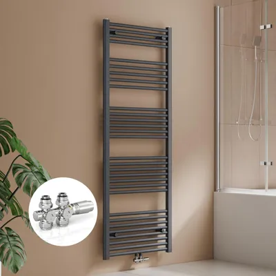 A bathroom setting with a towel radiator and a shower enclosure.