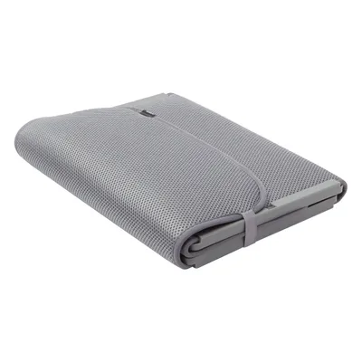 A folded gray shoe mat on a white background.