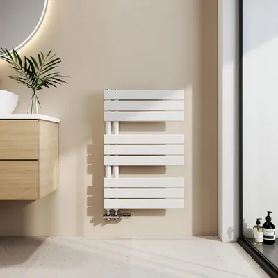 A modern bathroom setting with a white towel radiator, wooden vanity, and a round mirror.
