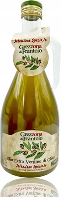 A bottle of olive oil on a white background.