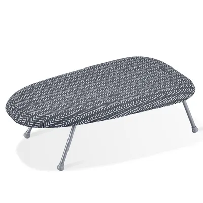 A small ironing board with a patterned cover and metal legs, isolated on a white background.