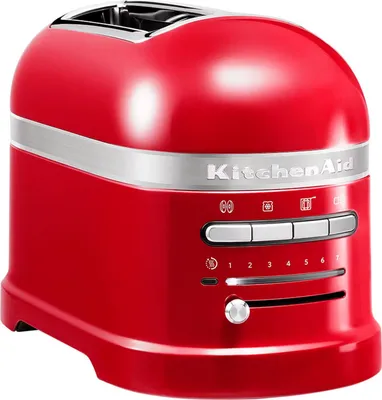A red KitchenAid toaster is shown from a front-diagonal angle against a white background.