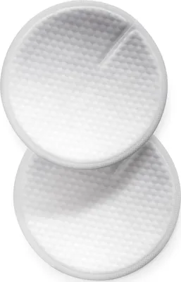 Two white breast pads are stacked on top of each other against a white background.