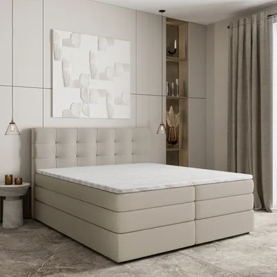 A bedroom scene with a bed as the main focus.