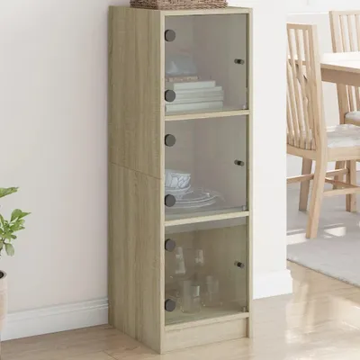 A tall, narrow cabinet with glass doors and wooden shelves, placed against a wall.