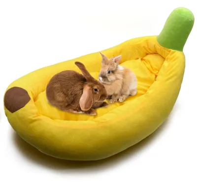 Zdjęcie produktu dla Legowisko dla królików z wyjmowaną podkładką - żółte, w kształcie banana