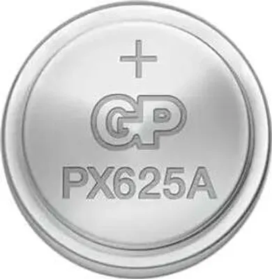 A close-up, top-down view of a single silver coin-cell battery.