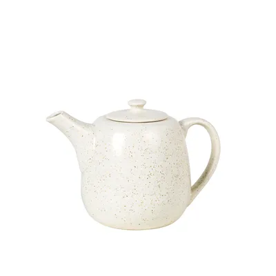 A white speckled teapot on a white background.