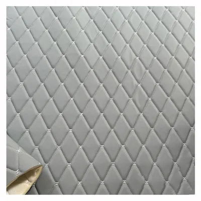 Image de Tissu imitation cuir texturé, idéal pour l'ameublement intérieur